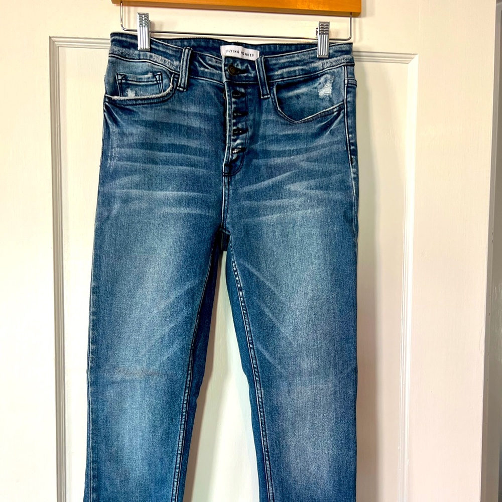 Adorable slim-fit, slightly distressed jeans.